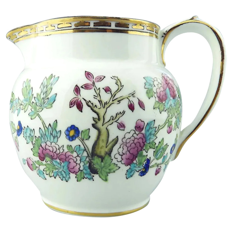 An antique Harrods Victorian pottery hand coloured Indian Tree Jug C.1891+