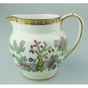 An antique Harrods Victorian pottery hand coloured Indian Tree Jug C.1891+