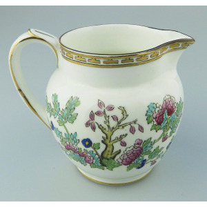 An antique Harrods Victorian pottery hand coloured Indian Tree Jug C.1891+