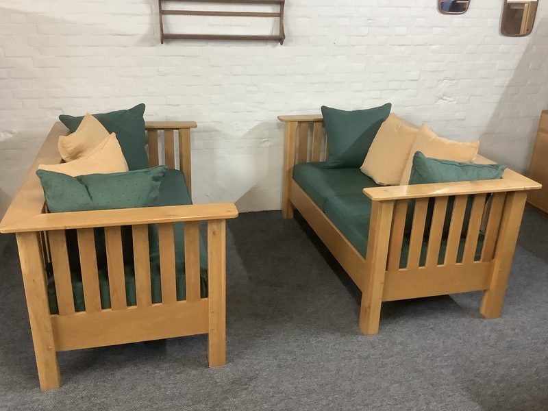 A Substantial Pair Of 3 Seater Settees In Solid English Light Oak.