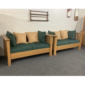 A Substantial Pair Of 3 Seater Settees In Solid English Light Oak.