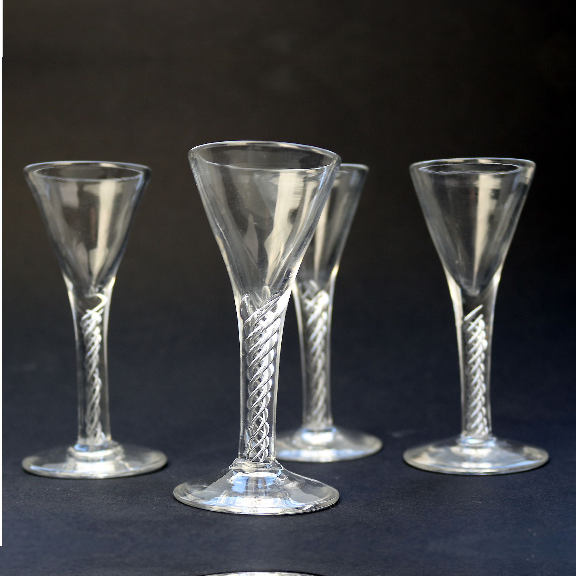 A set of 4X antique stemware hand blown air twist Shot Glasses C. early 20thC