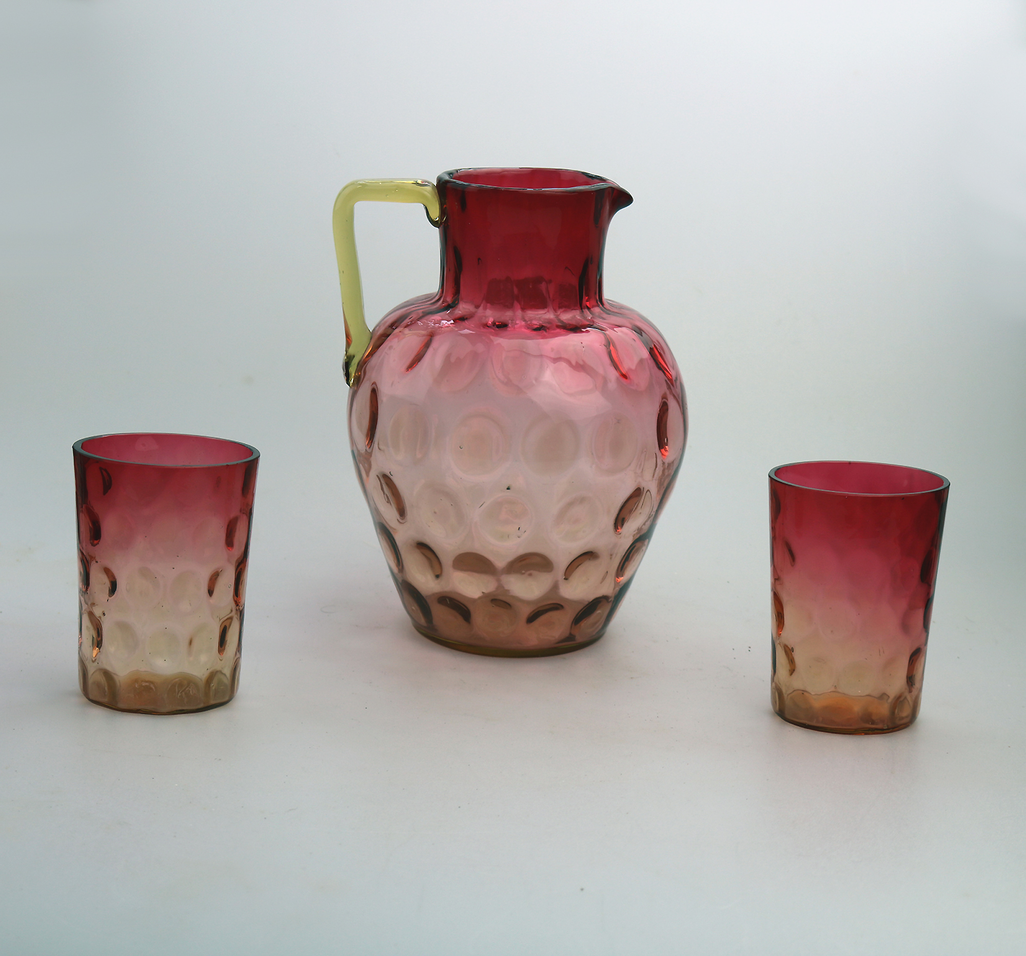 A good antique Victorian glass dimpled amberina cranberry Lemonade Set C.19thC