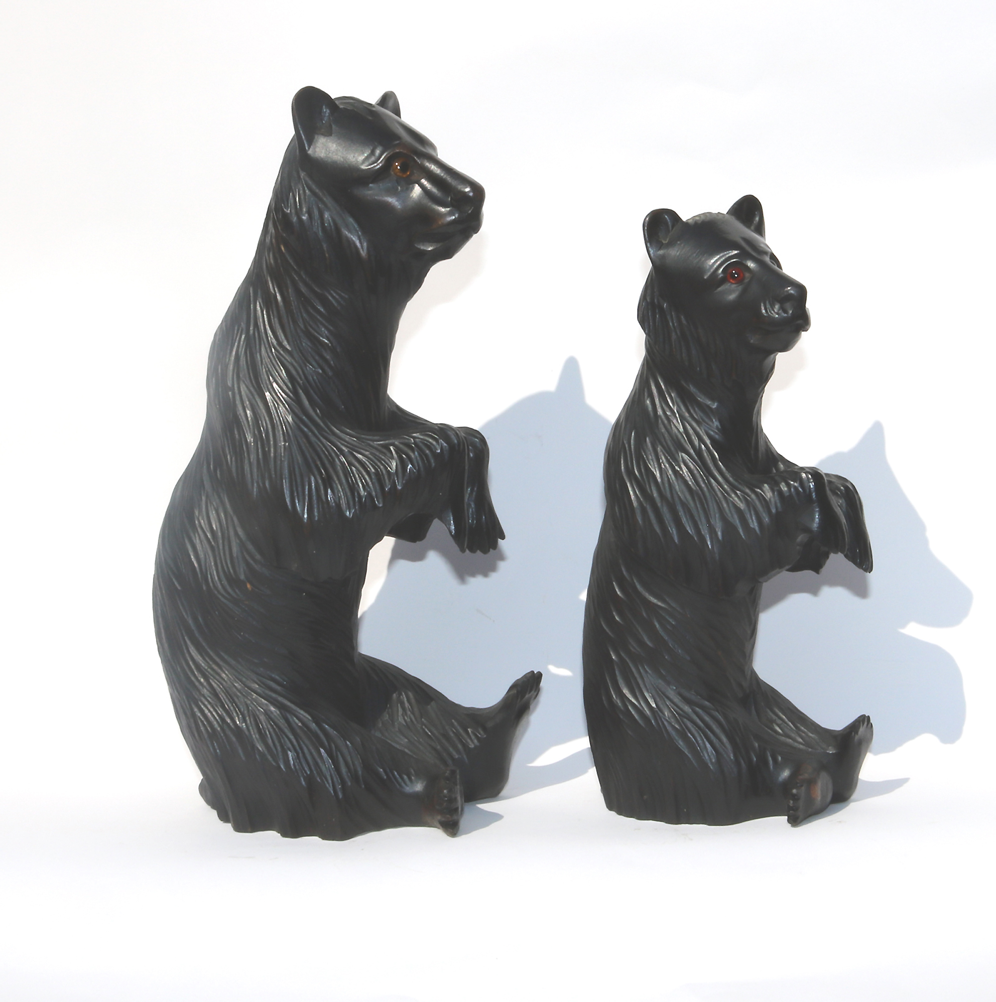 A large pair of good antique Treen Black Forest Begging Bears with glass eyes C.19thC