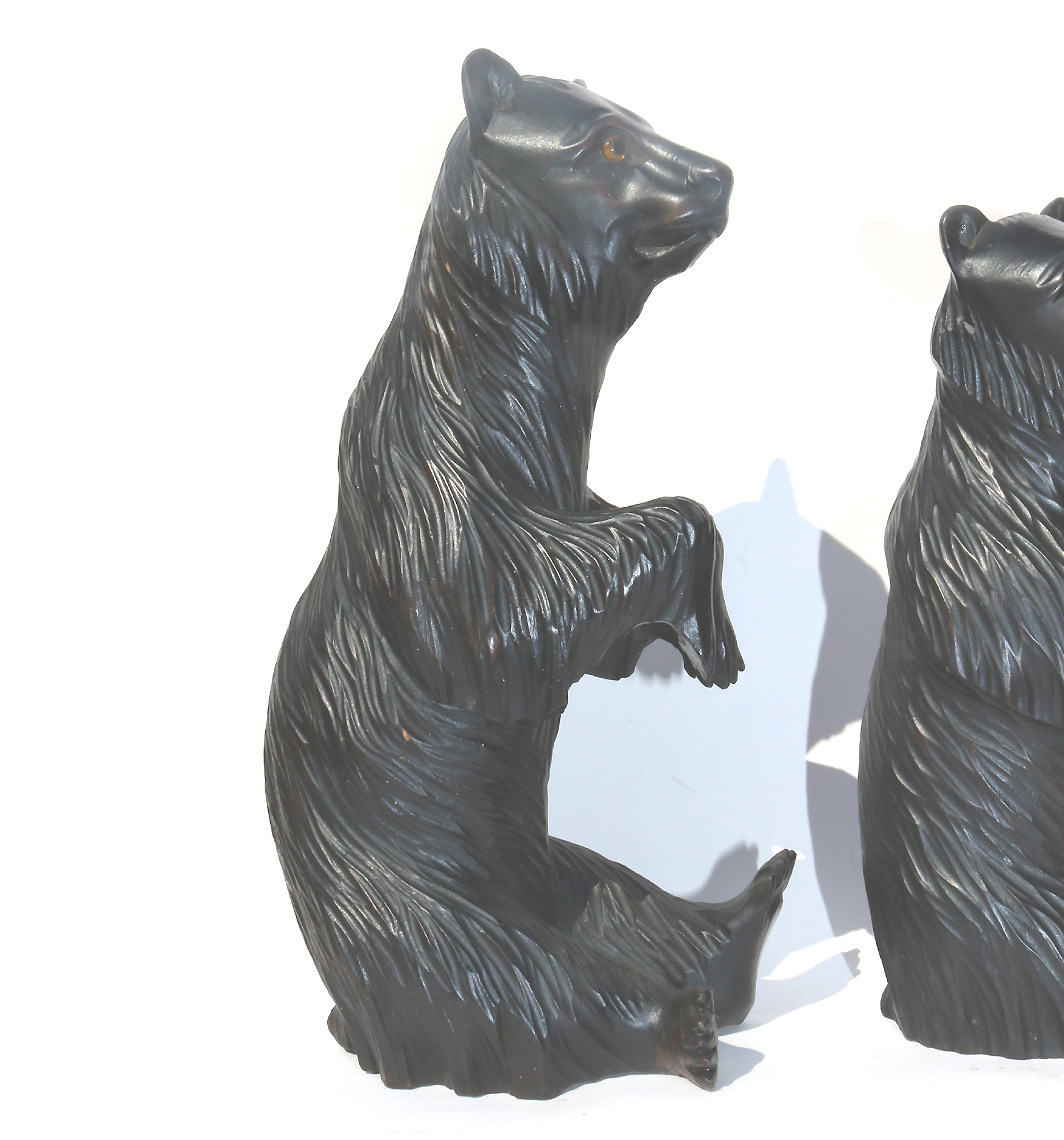 A large pair of good antique Treen Black Forest Begging Bears with glass eyes C.19thC