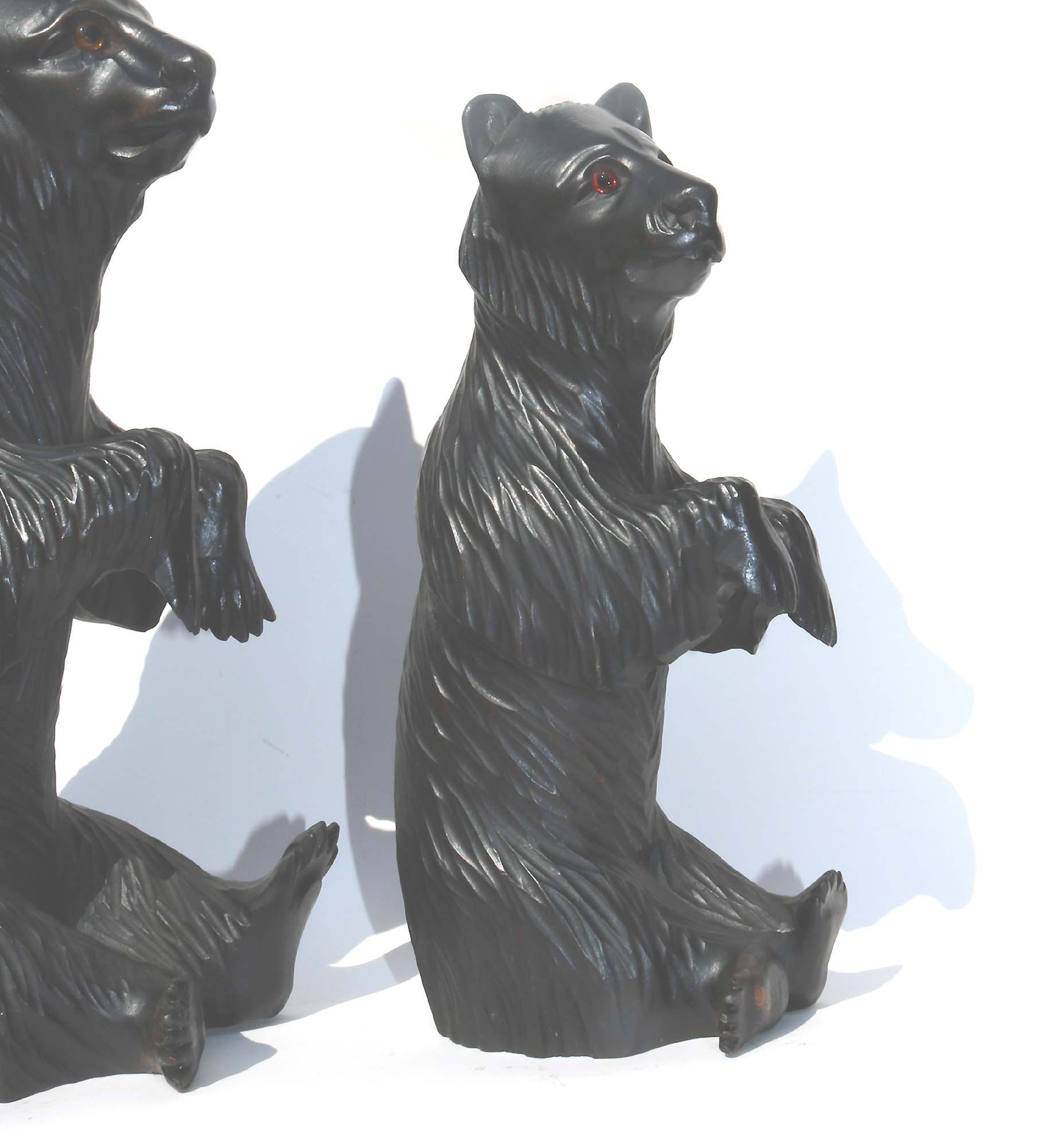 A large pair of good antique Treen Black Forest Begging Bears with glass eyes C.19thC
