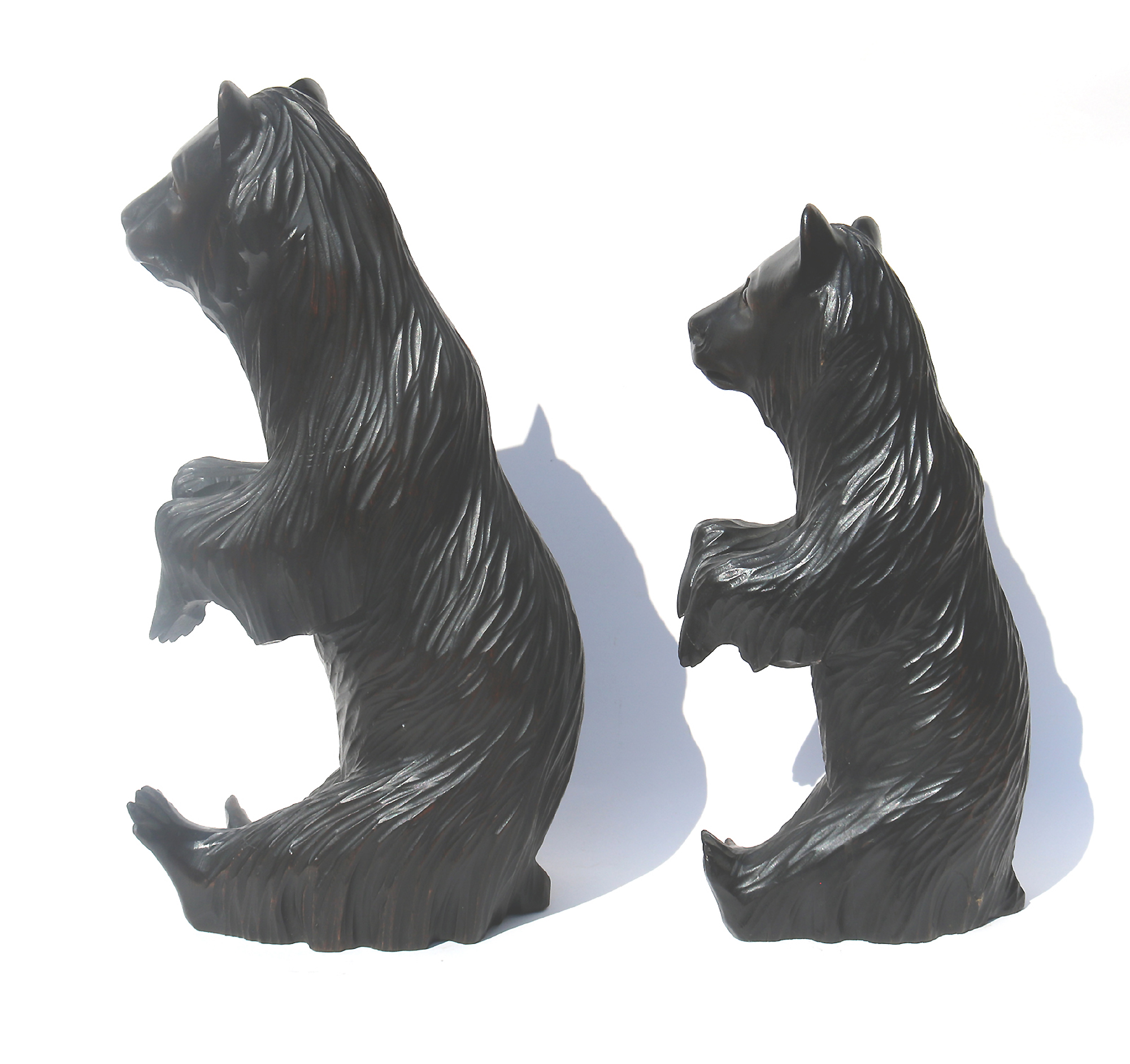 A large pair of good antique Treen Black Forest Begging Bears with glass eyes C.19thC