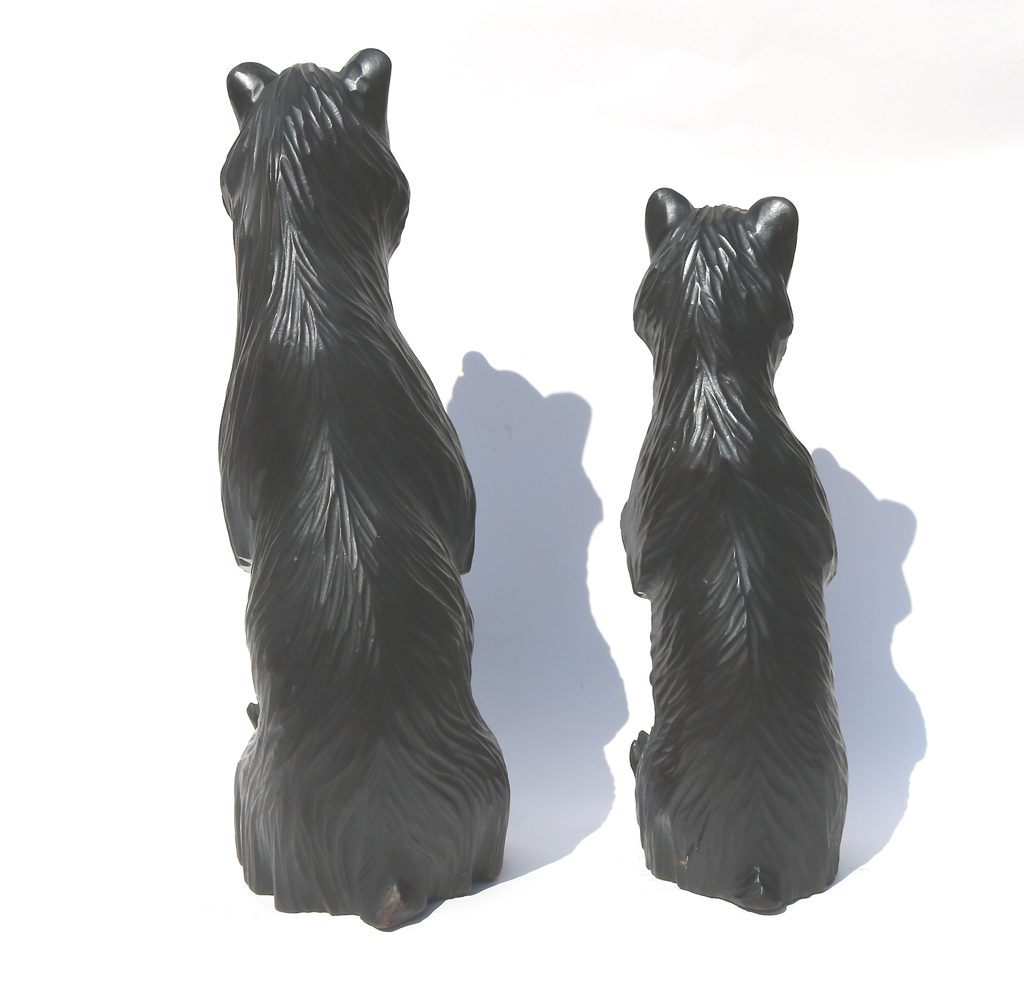 A large pair of good antique Treen Black Forest Begging Bears with glass eyes C.19thC