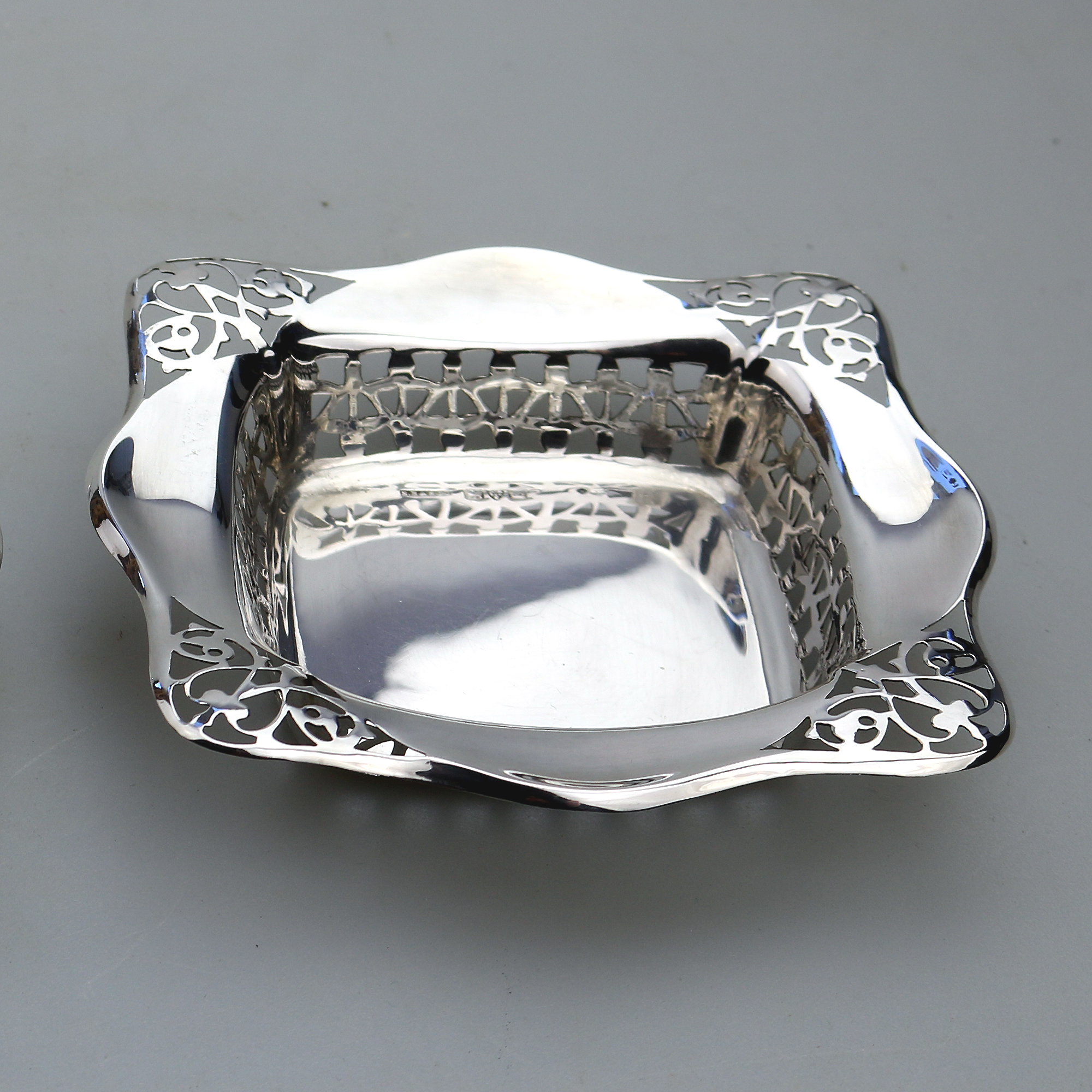 A good antique English Chester solid silver pierced square Bonbon Dish C.1927