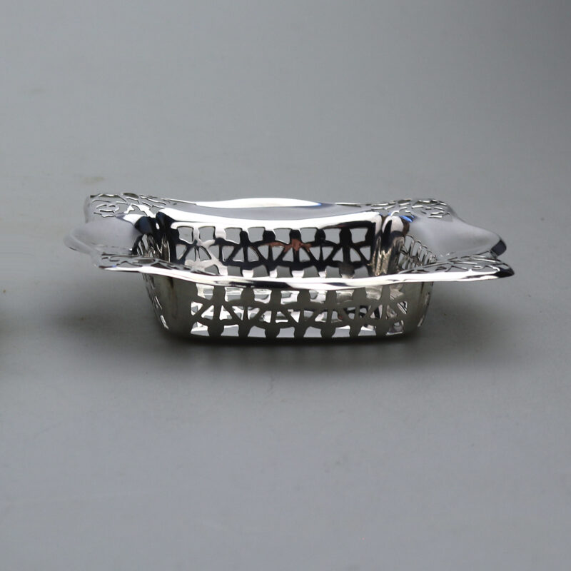 A good antique English Chester solid silver pierced square Bonbon Dish C.1927