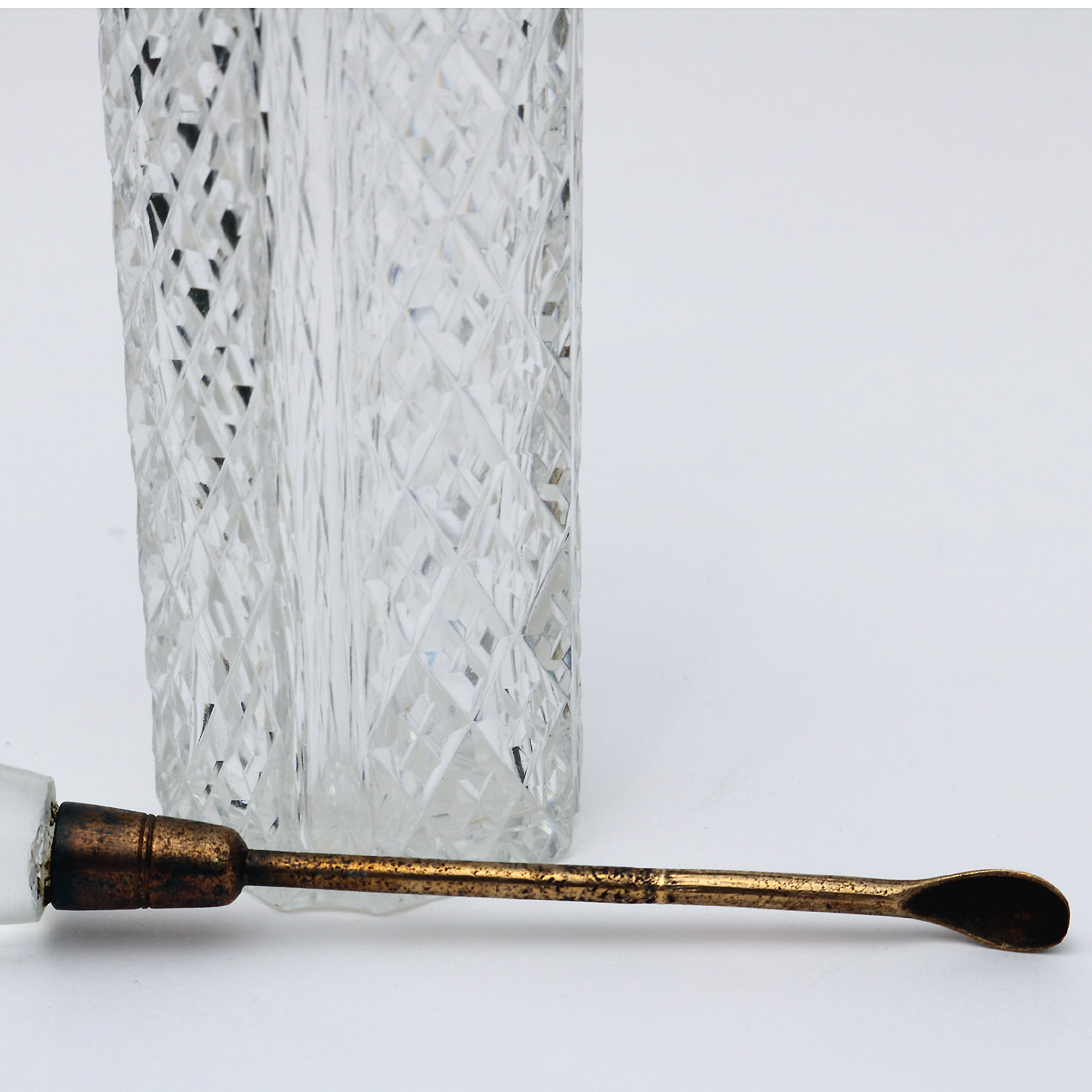 An antique cut glass Cayenne Pepper Cruet Bottle & gilt Spoon C.19thC