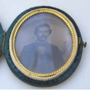A small & oval antique Victorian daguerreotype in original velvet case C.1850's