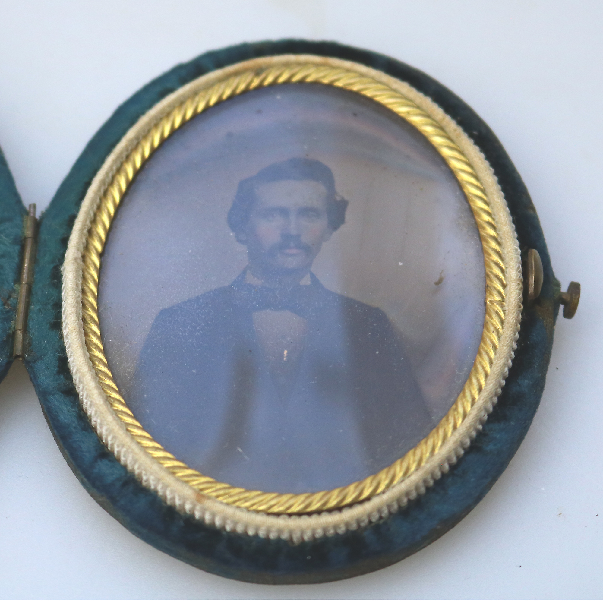A small & oval antique Victorian daguerreotype in original velvet case C.1850's