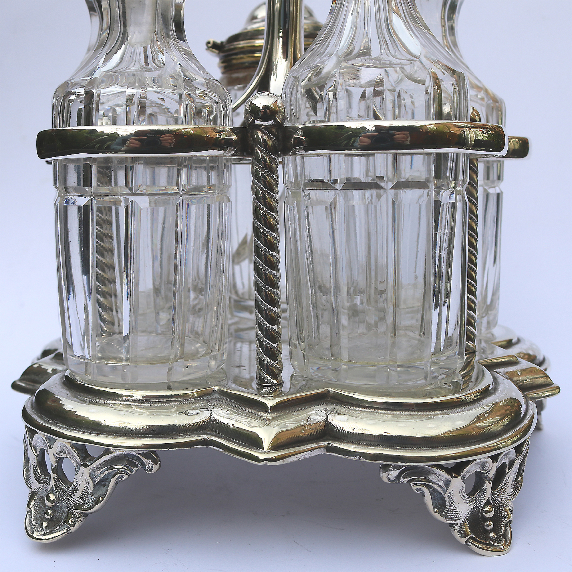 A good antique English silver plate & cut glass 5-bottle table cruet stand C.19thC