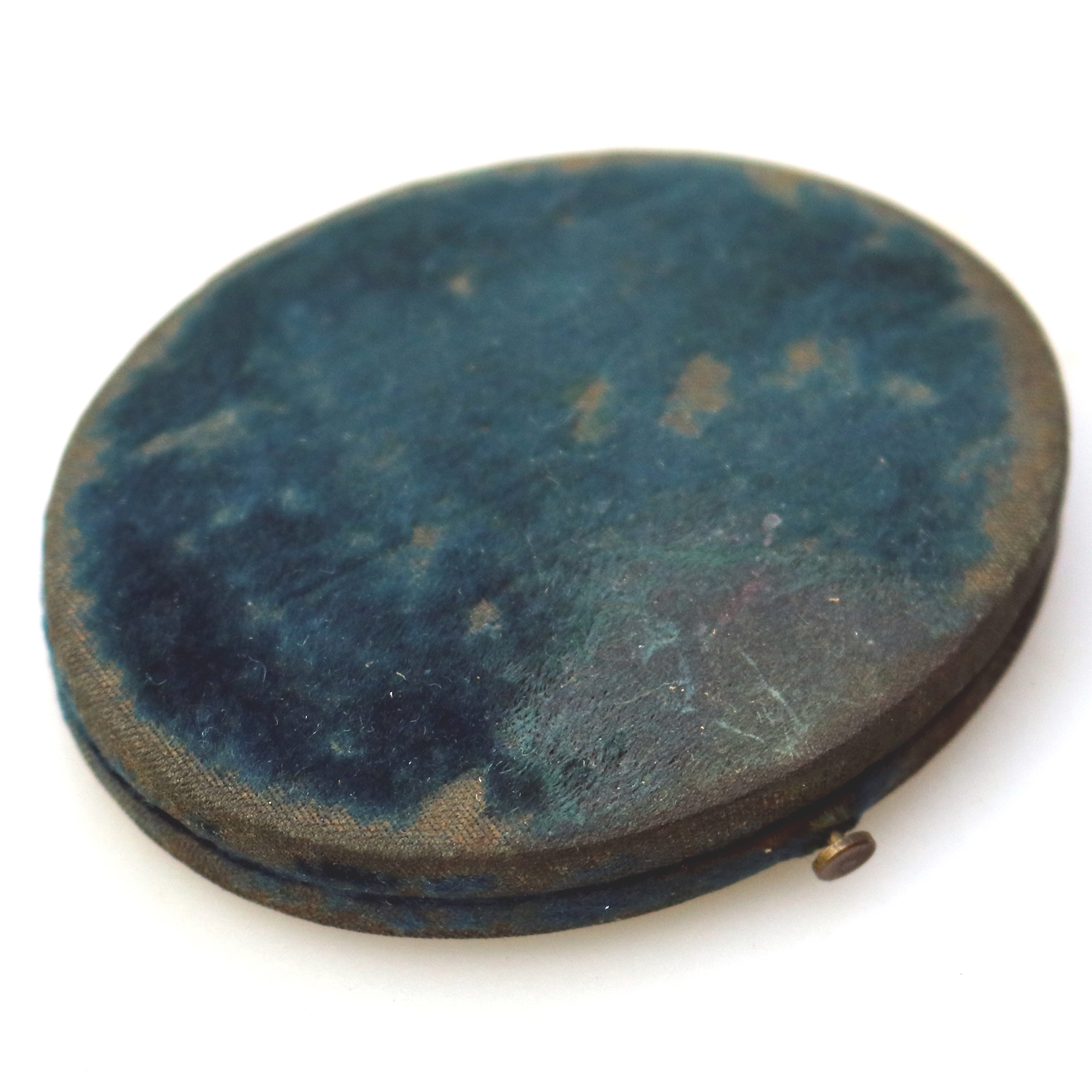 A small & oval antique Victorian daguerreotype in original velvet case C.1850's