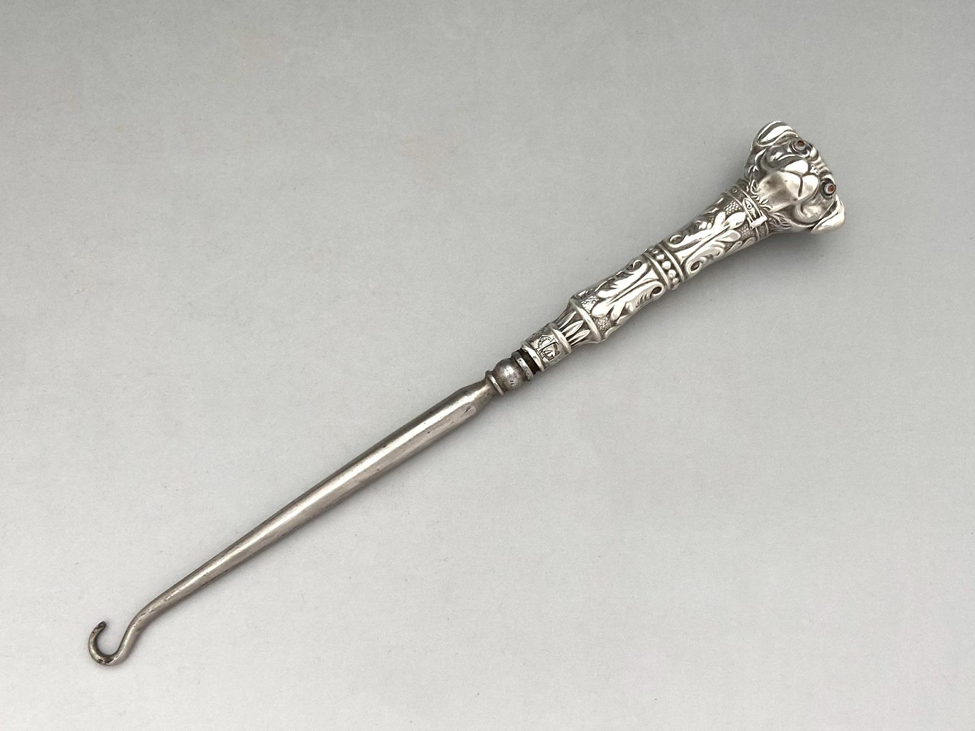 A rare antique English solid silver novelty double dog head Button Hook C.1906
