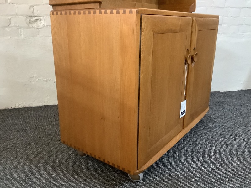 Ercol Windsor Bookcase Cabinet In Light Finish.
