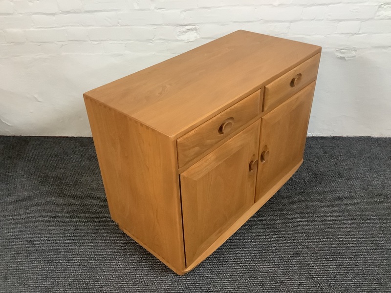 Ercol Windsor Cabinet In Light Finish.