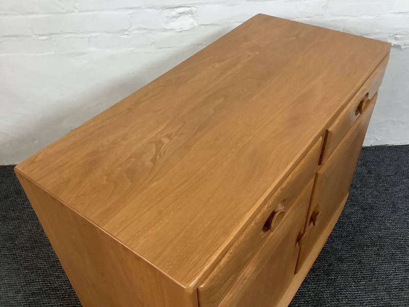 Ercol Windsor Cabinet In Light Finish.