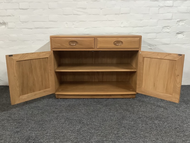 Ercol Windsor Cabinet In Light Finish.