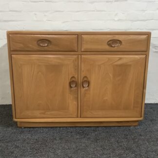 Ercol Windsor Cabinet In Light Finish.