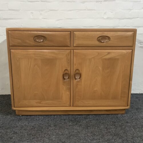 Ercol Windsor Cabinet In Light Finish.