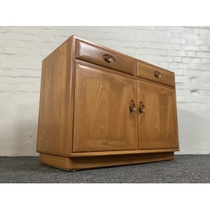 Ercol Windsor Cabinet In Light Finish.