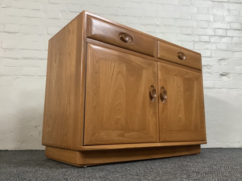 Ercol Windsor Cabinet In Light Finish.