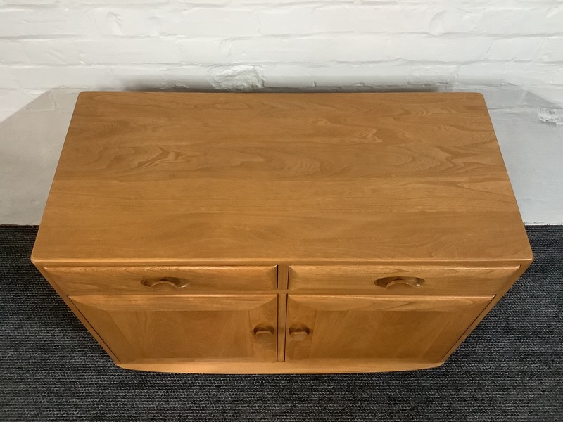 Ercol Windsor Cabinet In Light Finish.