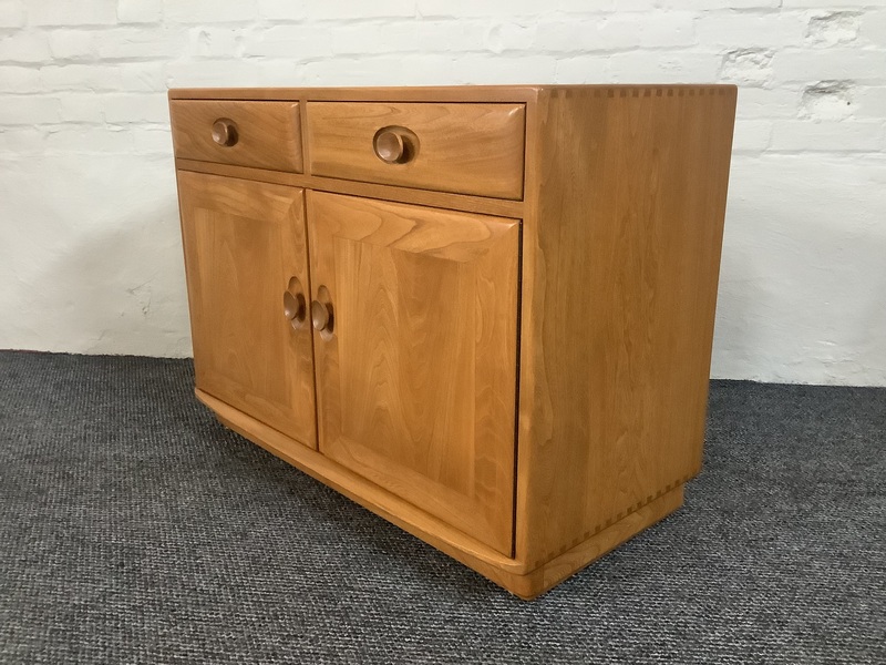 Ercol Windsor Cabinet In Light Finish.