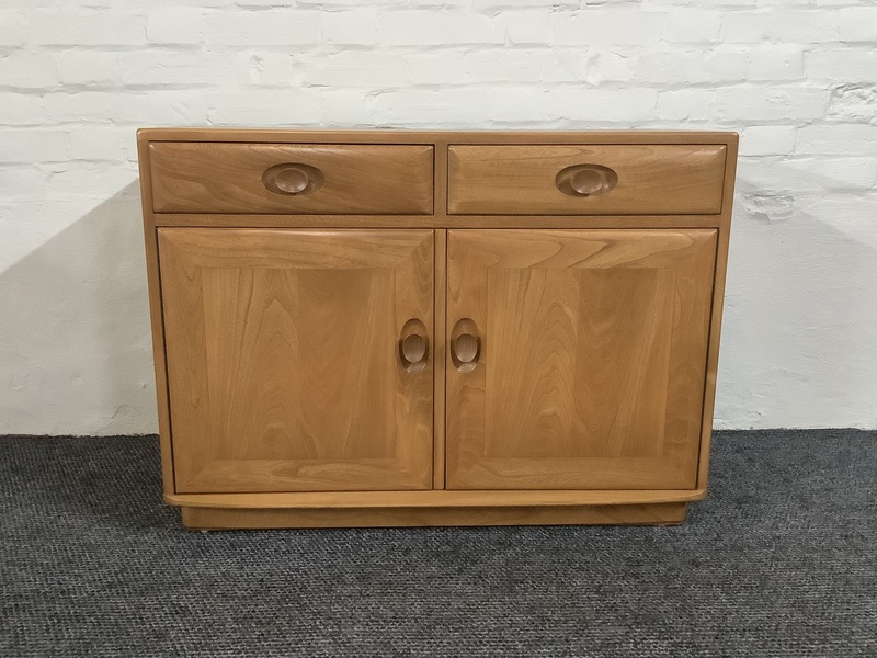 Ercol Windsor Cabinet In Light Finish.
