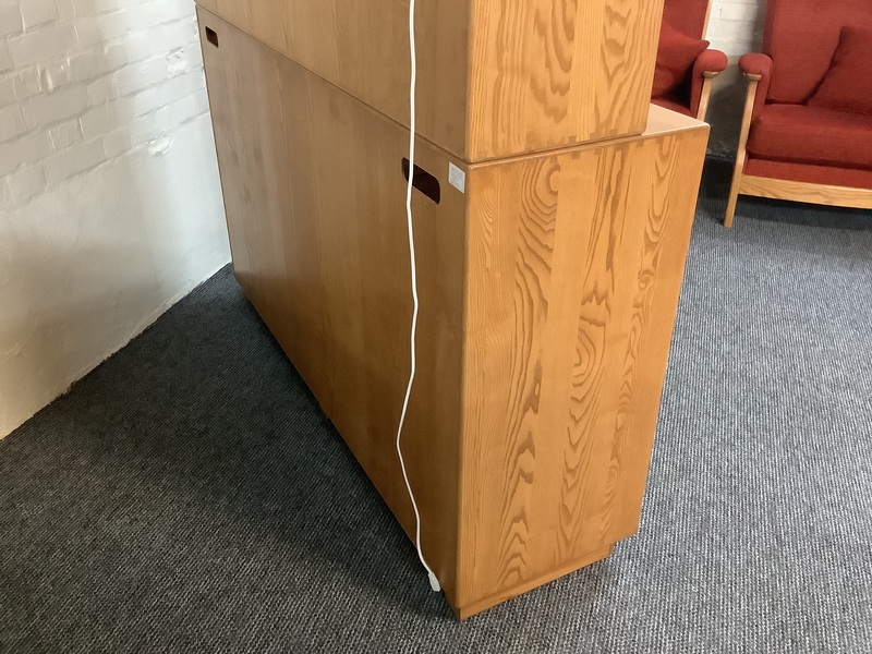 Ercol Windsor High Display Cabinet In Light Finish.
