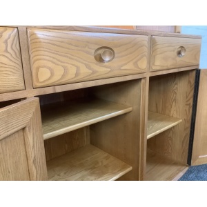Ercol Windsor High Display Cabinet In Light Finish.