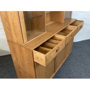Ercol Windsor High Display Cabinet In Light Finish.