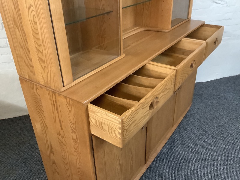 Ercol Windsor High Display Cabinet In Light Finish.