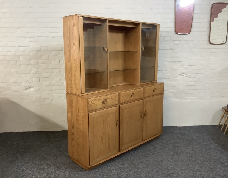Ercol Windsor High Display Cabinet In Light Finish.