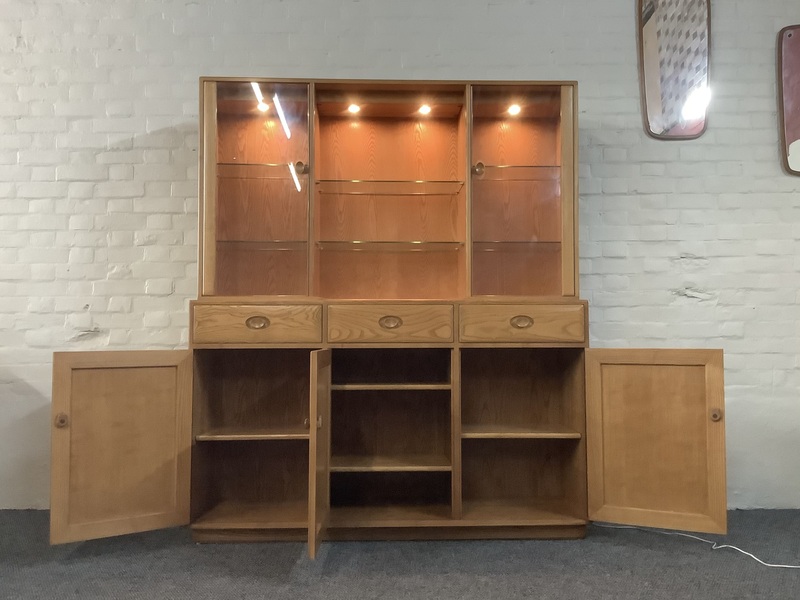 Ercol Windsor High Display Cabinet In Light Finish.