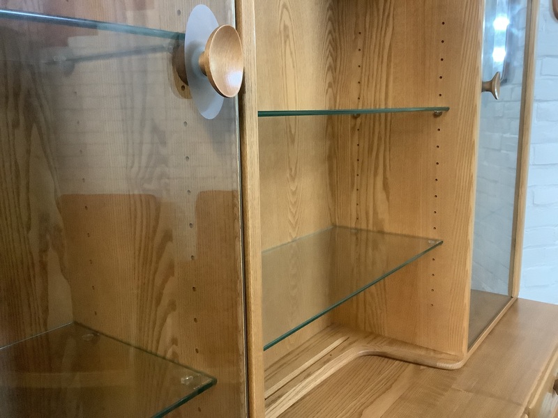 Ercol Windsor High Display Cabinet In Light Finish.