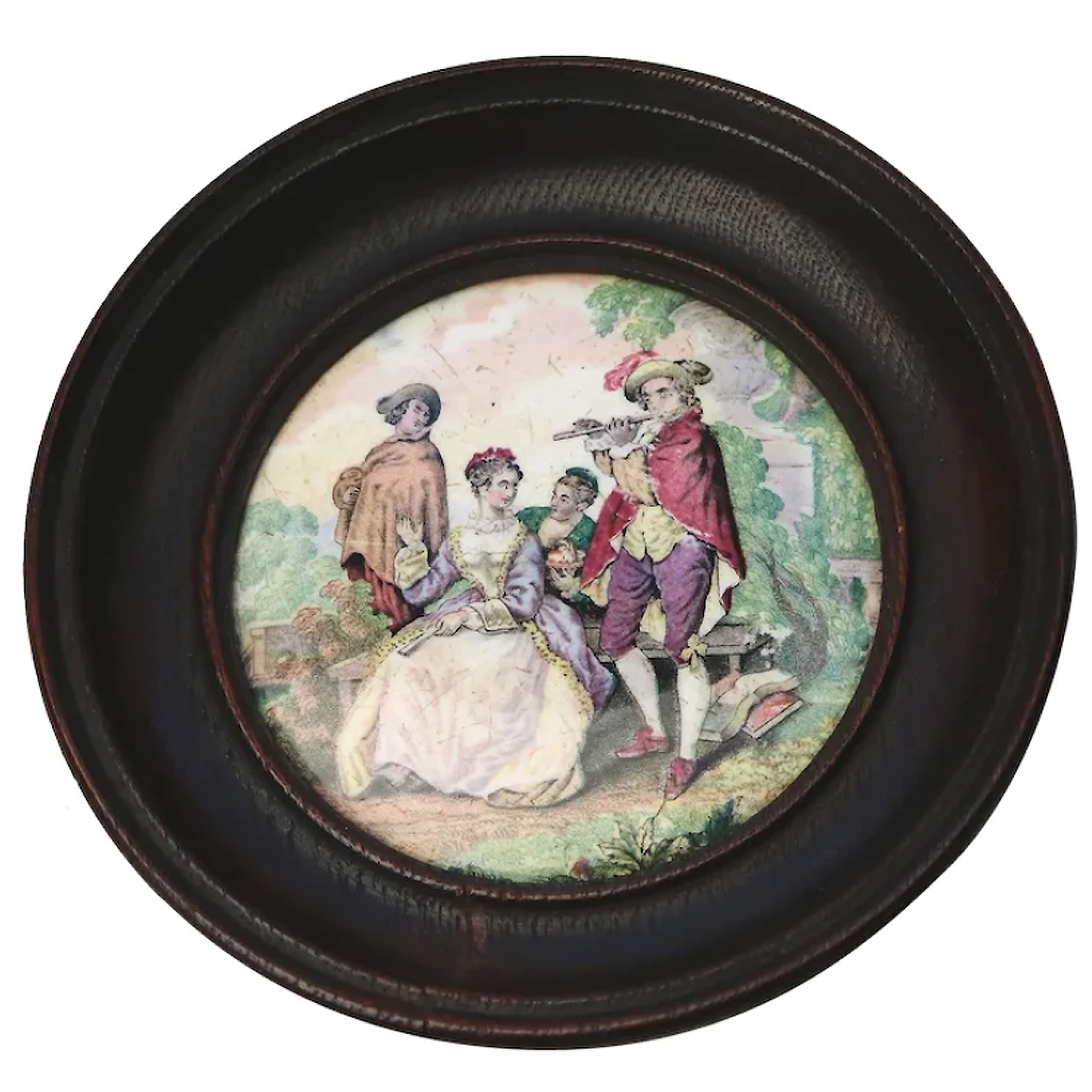 An antique framed English Prattware pottery Pot Lid The Flute Player C.19thC