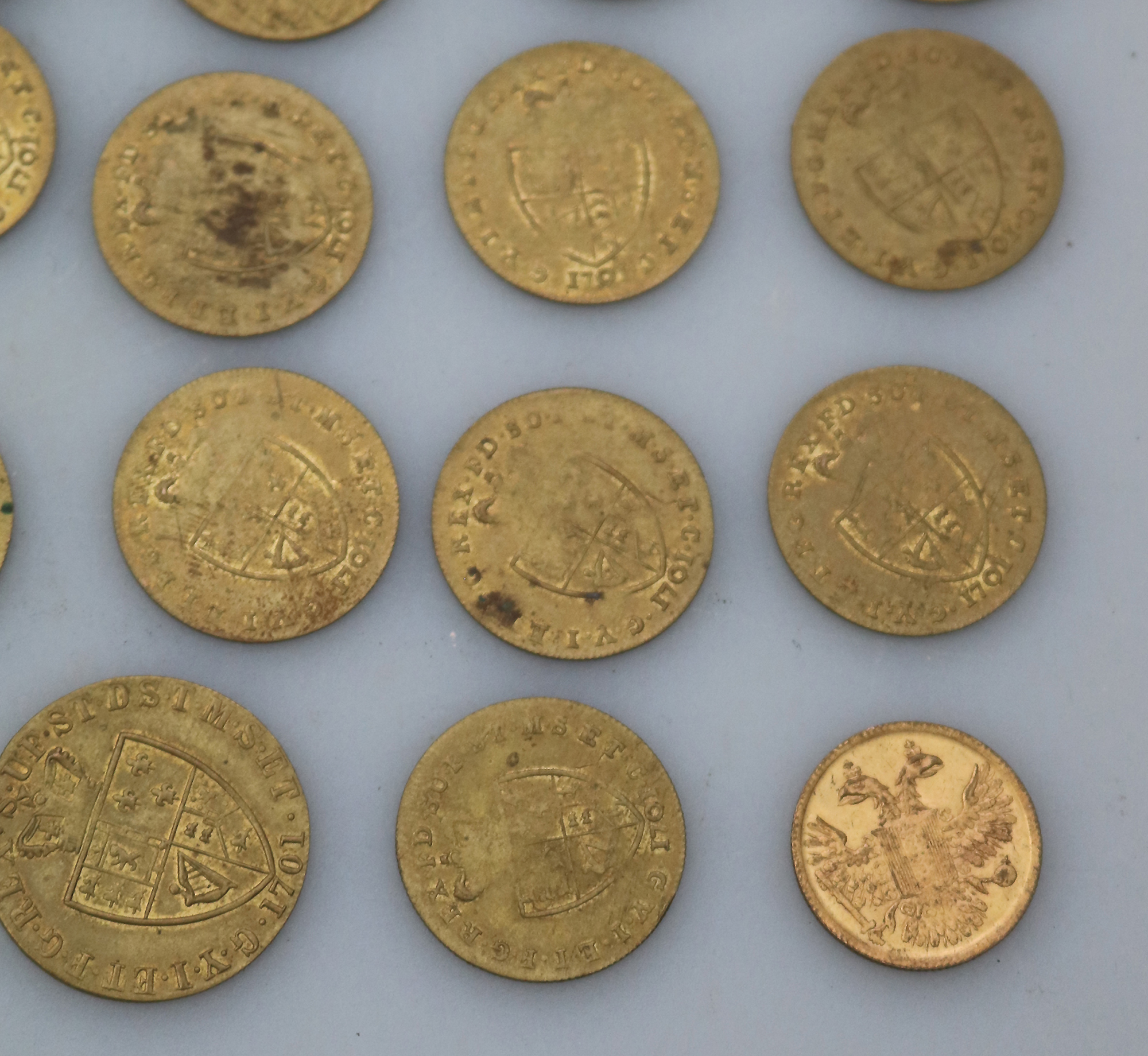 Sporting Antiques lot of 24 faux James II gilt brass Gaming Counters C.19thC