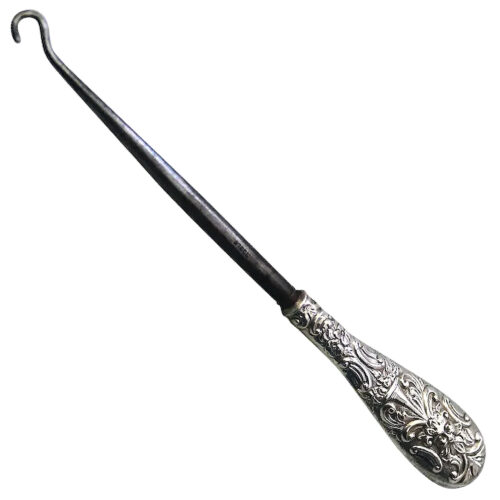 A quality antique solid silver Green Man handled Button Hook Boot Pull C.1900
