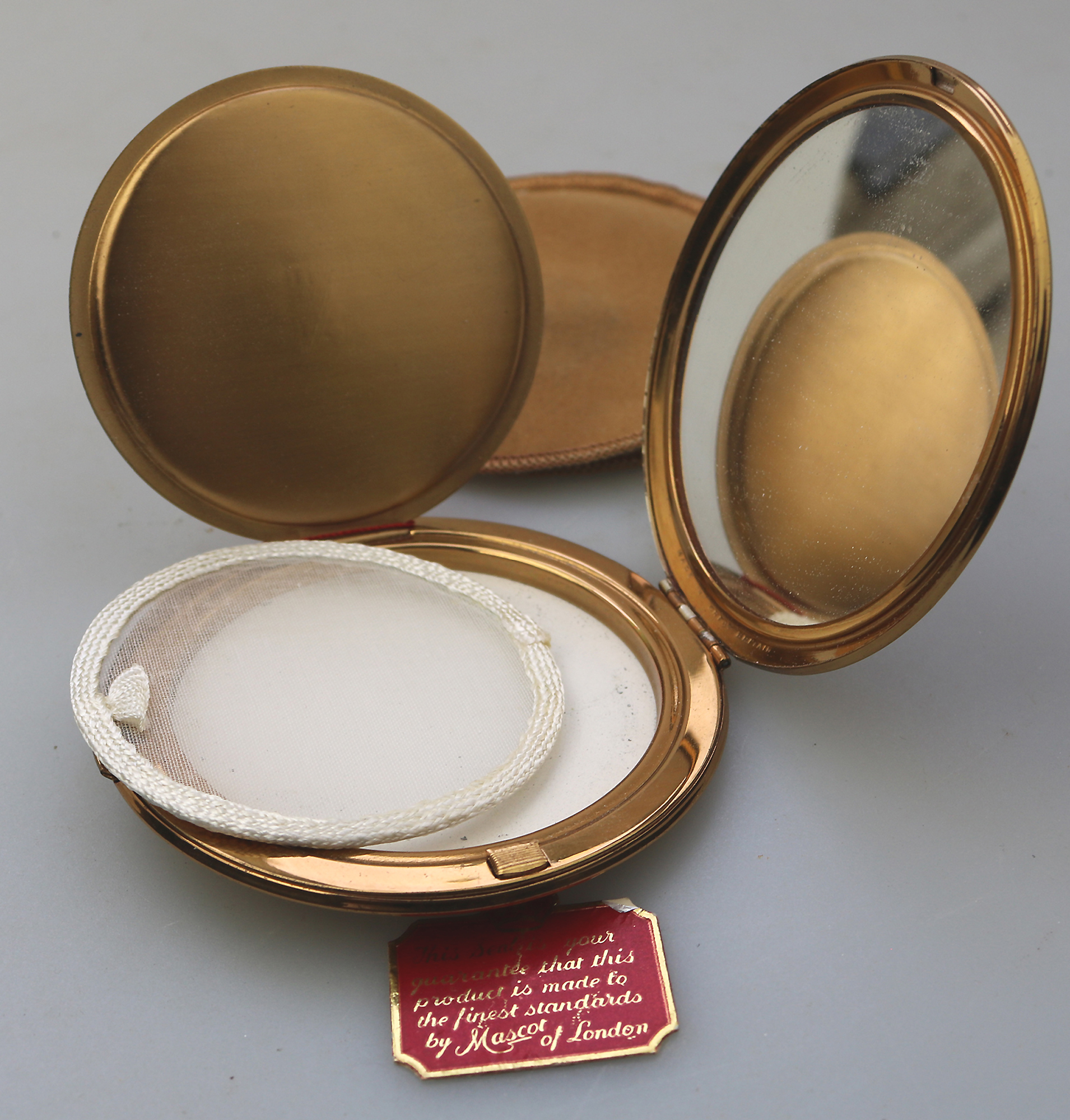 A very fine mid-century AS Brown Mascot diamante Compact unused & label C.1950's