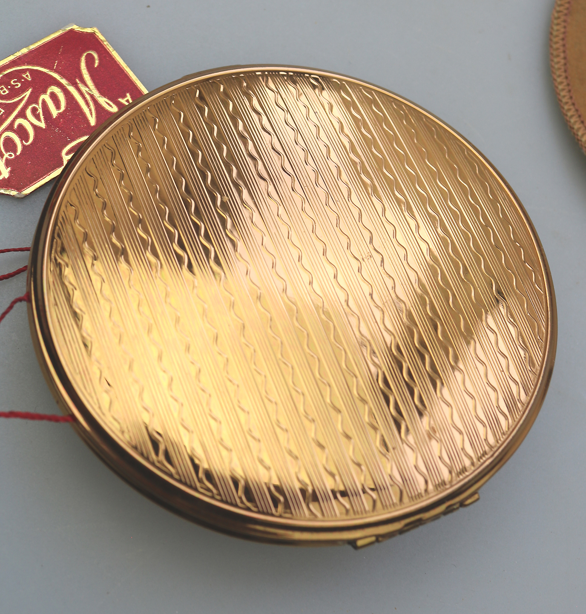 A very fine mid-century AS Brown Mascot diamante Compact unused & label C.1950's