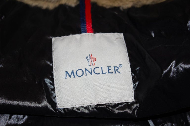 Moncler White Hooded Jacket with Fur trim