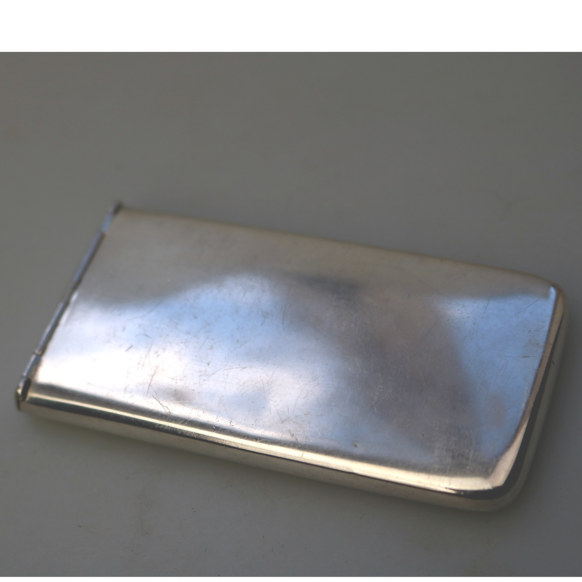 A very rare solid silver patent novelty Card Case with tambour mechanism 44g 1927