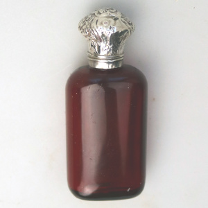 A good antique solid silver and ruby glass Scent Bottle C.19thC