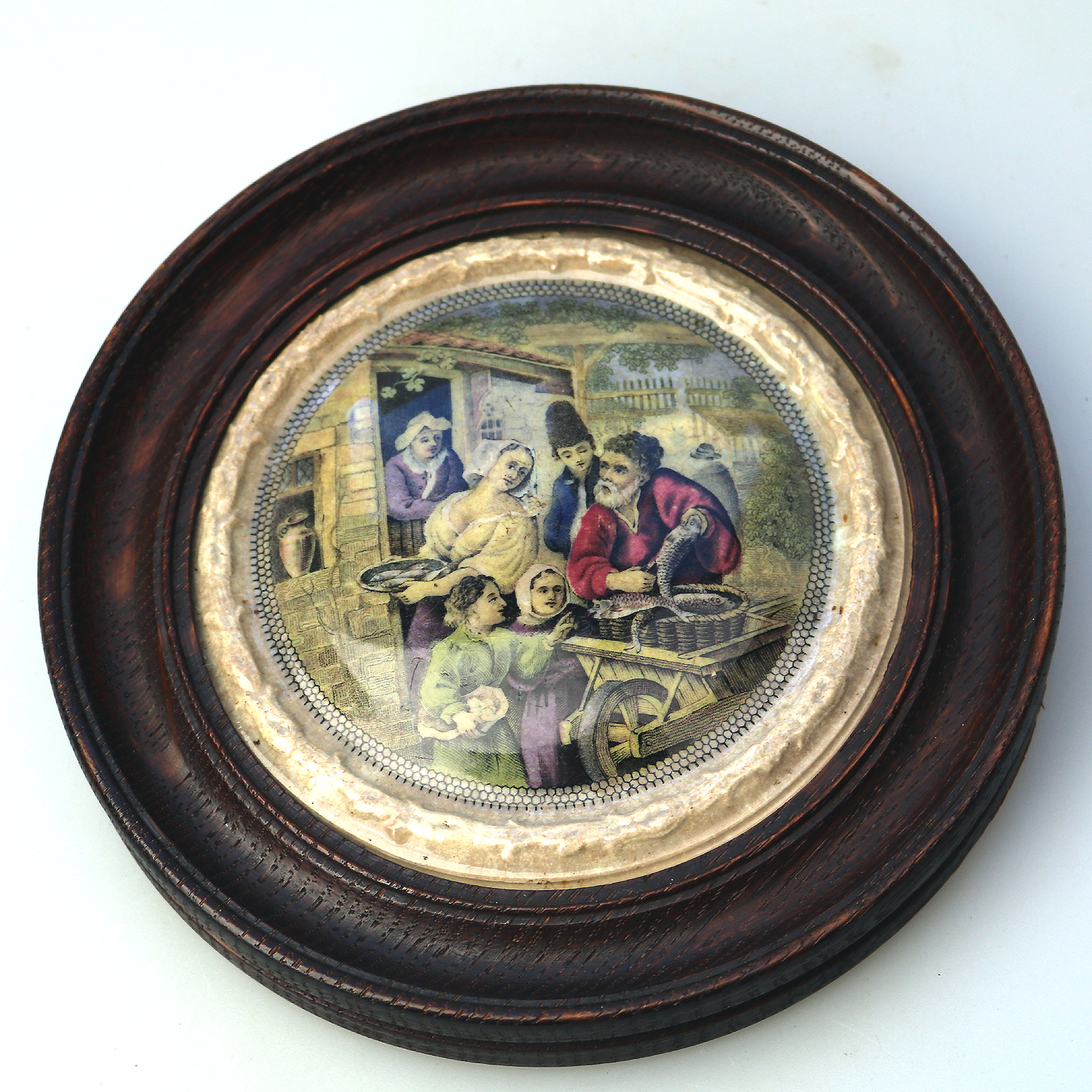 An antique framed English Prattware pottery Pot Lid The Fishbarrow C.19thC
