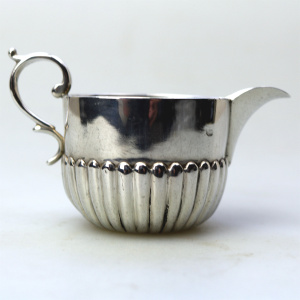 A small antique Victorian English sterling solid silver Cream Jug for one C.1886