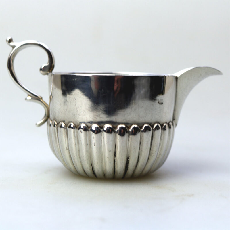 A small antique Victorian English sterling solid silver Cream Jug for one C.1886