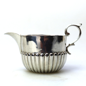 A small antique Victorian English sterling solid silver Cream Jug for one C.1886